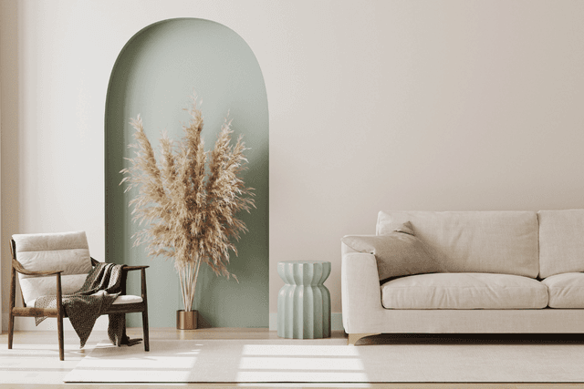 Living room with arched feature wall and neutral furniture