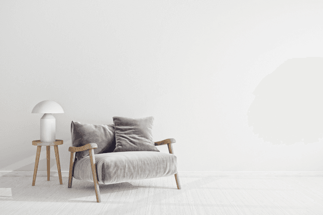 Minimal chair and side table with soft daylight